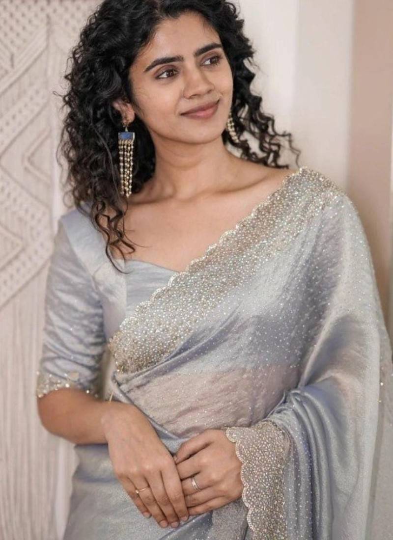 Grey fendy chiffon saree with artisan hand work & swarovski blouse