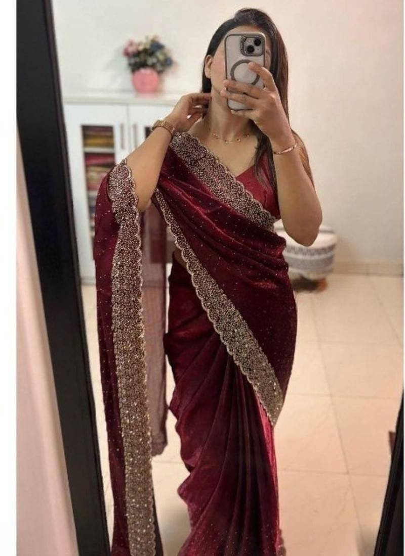 Maroon fendy chiffon saree with artisan hand work & swarovski blouse
