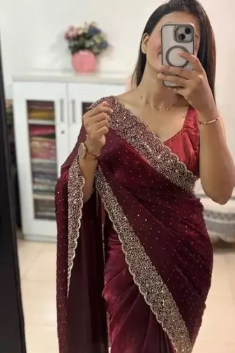 Maroon fendy chiffon saree with artisan hand work & swarovski blouse