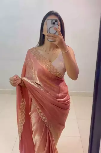 Peach fendy chiffon saree with elegant diamond work & matching blouse