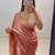 Peach fendy chiffon saree with elegant diamond work & matching blouse