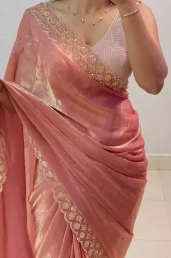 Peach fendy chiffon saree with elegant diamond work & matching blouse