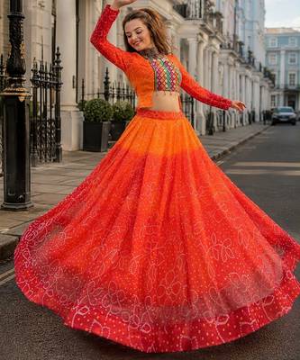 Orange Bandhani Free Size Stitched Navratri Lehenga Choli with Kutchi Gamthi Patche work 1