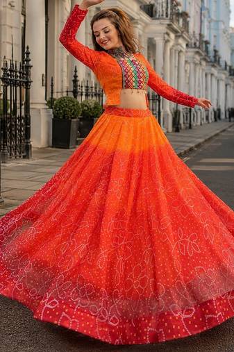Orange Bandhani Free Size Stitched Navratri Lehenga Choli with Kutchi Gamthi Patche work