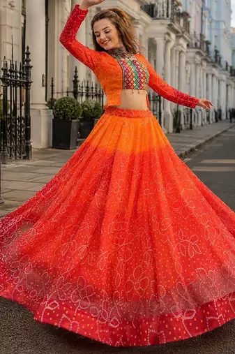 Orange Bandhani Free Size Stitched Navratri Lehenga Choli with Kutchi Gamthi Patche work