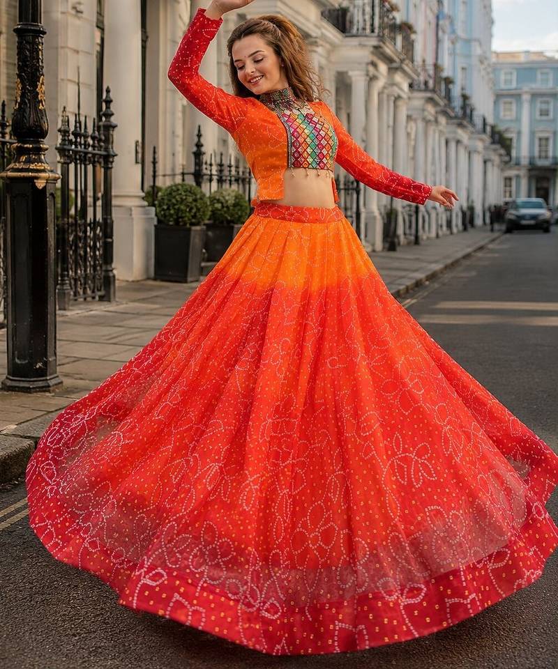 Orange Bandhani Free Size Stitched Navratri Lehenga Choli with Kutchi Gamthi Patche work