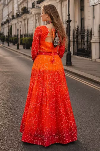 Orange Bandhani Free Size Stitched Navratri Lehenga Choli with Kutchi Gamthi Patche work