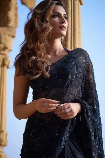 Black georgette saree with heavy multi-embroidery stitch work