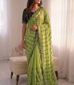 Parrot green viscose rangoli saree with floral embroidery & real mirror work