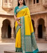 Yellow soft banarasi silk saree with zari weaving meenakari design
