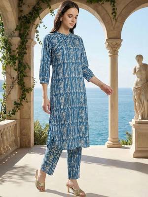 Women Printed Regular Pure Cotton Kurta with Trousers 1