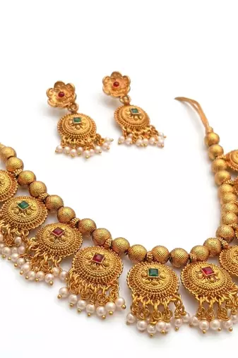 Handcrafted antique gold-plated ethnic necklace set with ruby stones & pearl drops | traditional indian jewelry