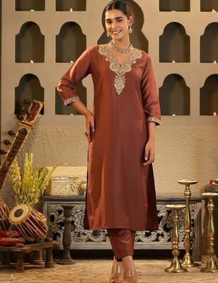 Women Solid Embroidered Kurta with Trousers 1