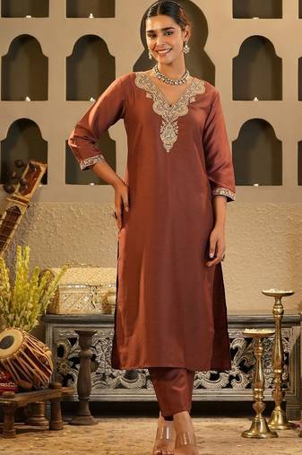 Women Solid Embroidered Kurta with Trousers