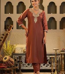 Women Solid Embroidered Kurta with Trousers