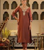 Women Solid Embroidered Kurta with Trousers
