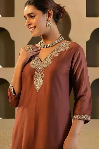 Women Solid Embroidered Kurta with Trousers
