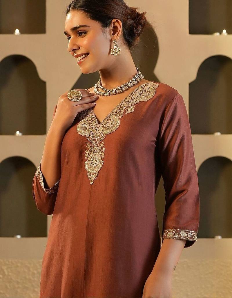 Women Solid Embroidered Kurta with Trousers