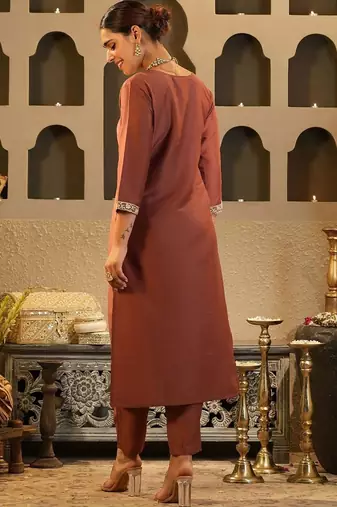 Women Solid Embroidered Kurta with Trousers