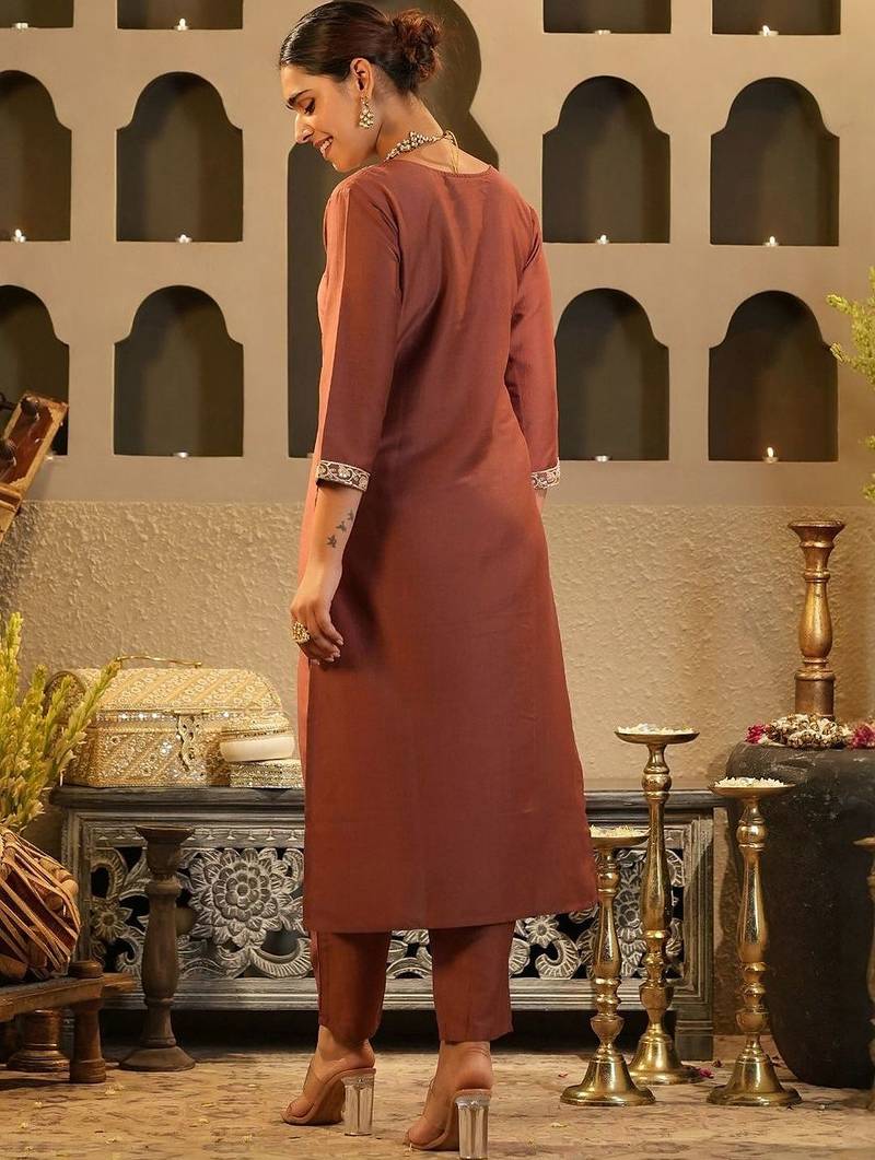 Women Solid Embroidered Kurta with Trousers