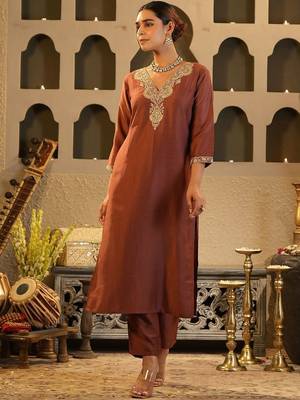 Women Solid Embroidered Kurta with Trousers 5
