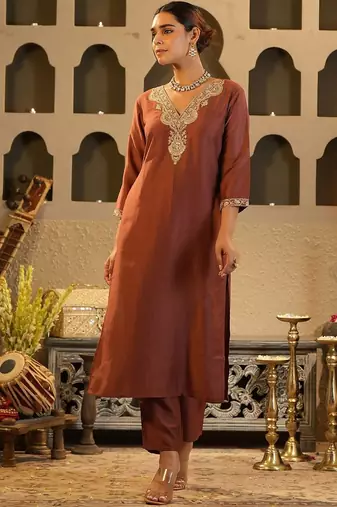 Women Solid Embroidered Kurta with Trousers