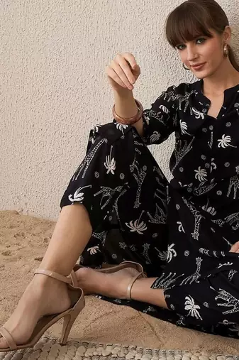 Quirky Printed Mandarin Collar A-Line Kurta With Trousers