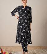 Quirky Printed Mandarin Collar A-Line Kurta With Trousers
