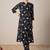 Quirky Printed Mandarin Collar A-Line Kurta With Trousers