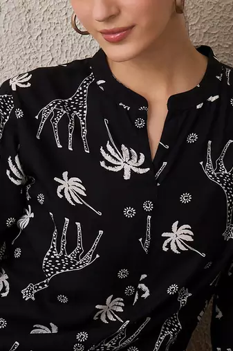 Quirky Printed Mandarin Collar A-Line Kurta With Trousers