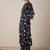 Quirky Printed Mandarin Collar A-Line Kurta With Trousers