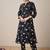 Quirky Printed Mandarin Collar A-Line Kurta With Trousers