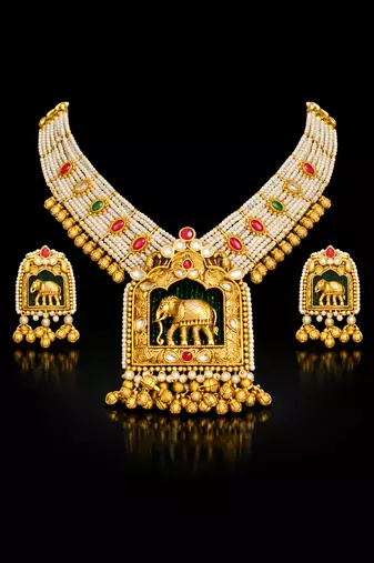 Handcrafted elephant motif gold-plated pearl necklace set - traditional ethnic jewelry for weddings & festivals
