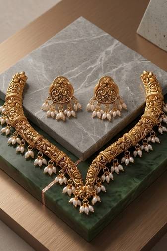 Handcrafted traditional gold-plated choker necklace set with pearl drops - ethnic jewelry for weddings