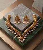 Handcrafted traditional gold-plated choker necklace set with pearl drops - ethnic jewelry for weddings