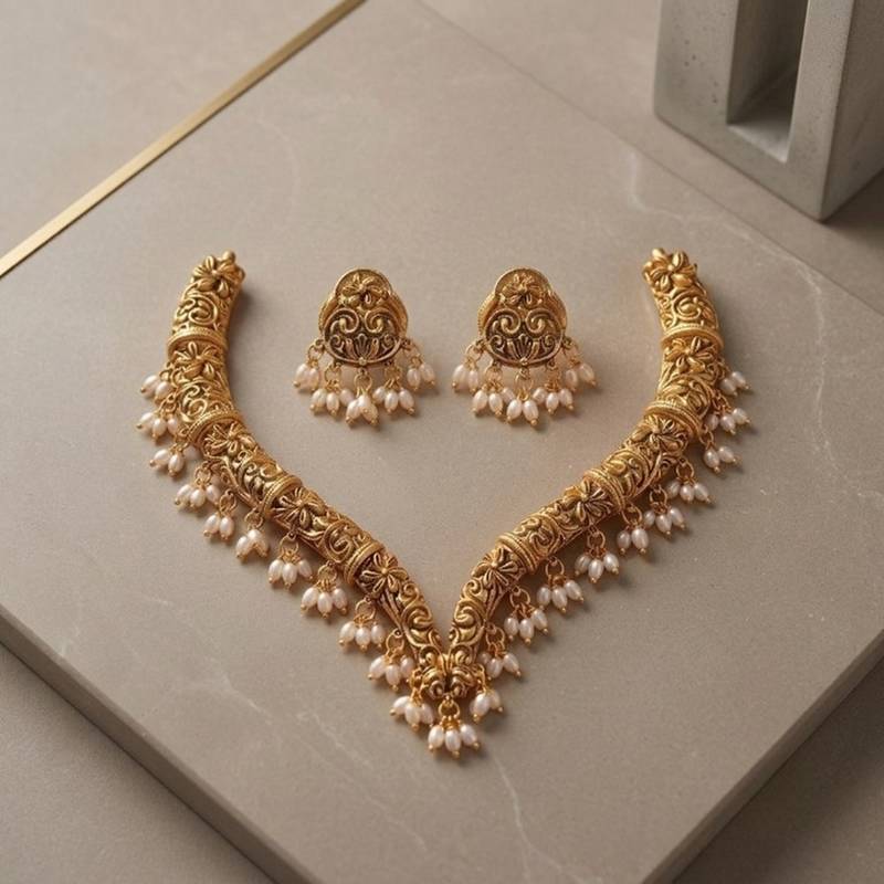 Handcrafted traditional gold-plated choker necklace set with pearl drops - ethnic jewelry for weddings