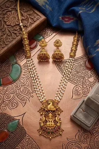 Gold plated south indian temple jewelry set - long pearl haram necklace with jhumka earrings for wedding