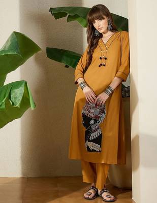 Women Mustard Embroidered A-Line Kurta Trousers Set 1