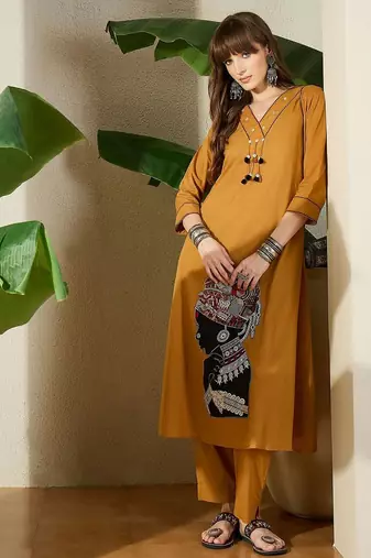 Women Mustard Embroidered A-Line Kurta Trousers Set
