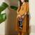 Women Mustard Embroidered A-Line Kurta Trousers Set