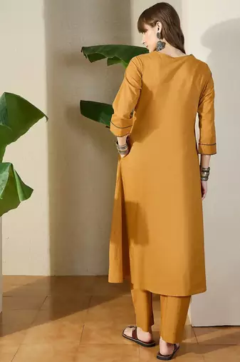 Women Mustard Embroidered A-Line Kurta Trousers Set