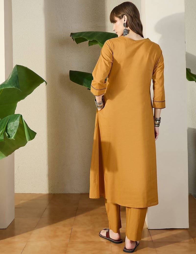 Women Mustard Embroidered A-Line Kurta Trousers Set