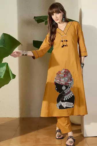 Women Mustard Embroidered A-Line Kurta Trousers Set