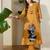 Women Mustard Embroidered A-Line Kurta Trousers Set
