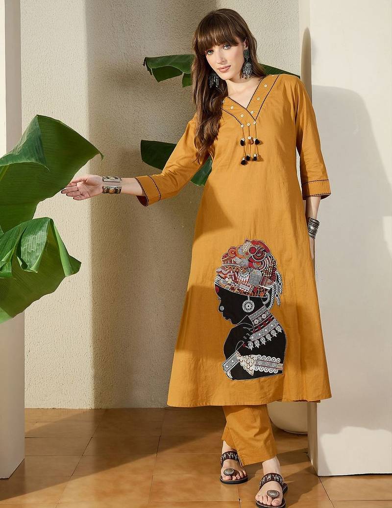 Women Mustard Embroidered A-Line Kurta Trousers Set