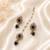 Designer circle and round shape small golden balls blue stone antique gold plated choker jewellery set for women