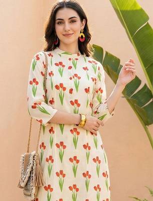 Women Floral Printed Regular Pure Cotton Kurta with Trousers 1