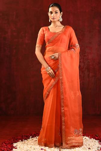 Bright orange embroidered organza saree set
