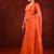 Bright orange embroidered organza saree set