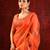 Bright orange embroidered organza saree set
